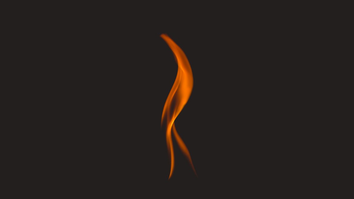 a single slender flame of orange fire against a dark grey background